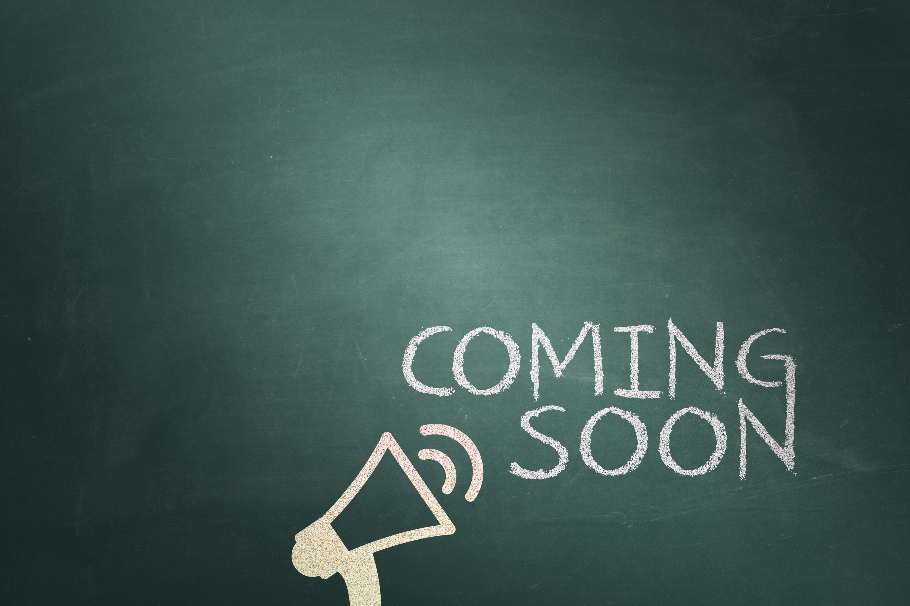 Coming soon message on chalkboard